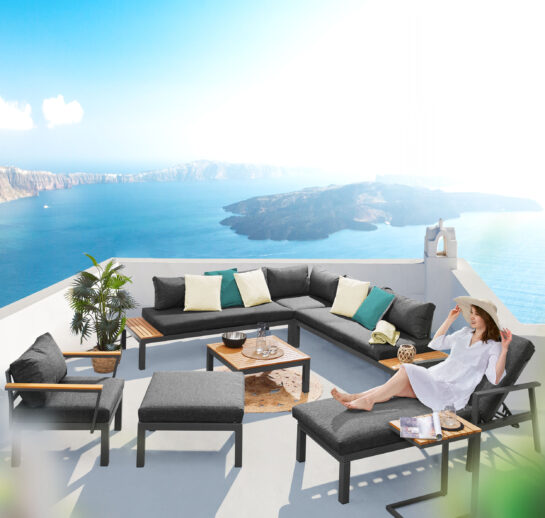 Chaise Lounge On The Terrace With Sea View. Santorini Island, Gr